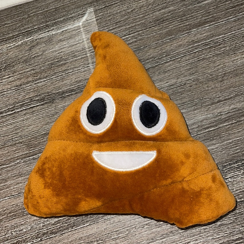 emoji poop throw pillow